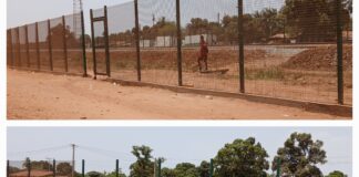 KAMSAR/DES HABITANTS VANDALISENT LES GRILLAGES LE LONG DES RAILS