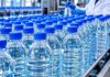 EAU EN GUINÉE : DES PRIX PLAFONNÉS, MAIS L’ATTENTE CONTINUE