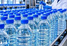EAU EN GUINÉE : DES PRIX PLAFONNÉS, MAIS L’ATTENTE CONTINUE